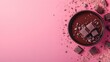 © MagiCraft - Bowl of chocolate with chunks on pink background