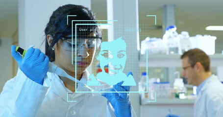  - Image of data processing over biracial female scientist in laboratory