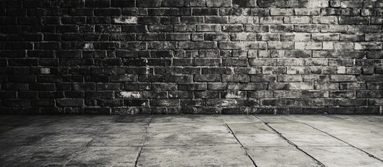 Poster - Dark textured brick wall background with concrete floor and copy space for text. High-resolution urban setting for graphic design.