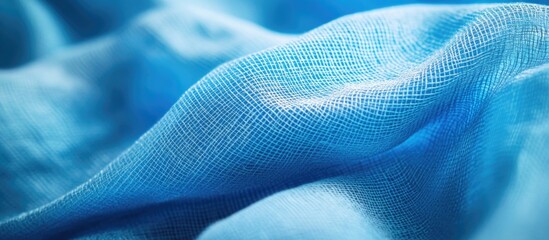 Poster - Close-up of soft blue fabric texture with subtle light reflections and shadows Copy Space
