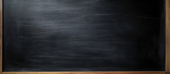 Poster - Black chalkboard surface with wood frame suitable for educational and creative purposes Copy Space