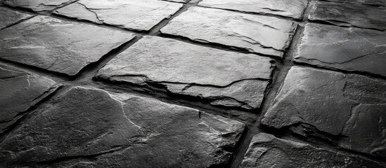 Poster - Textured stone tiles surface in monochrome tone with noticeable cracks and imperfections Copy Space