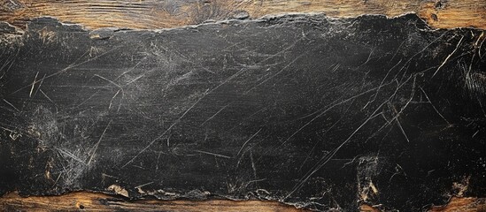 Poster - black slate surface with scratches and natural texture ideal for backgrounds or surfaces with copy s