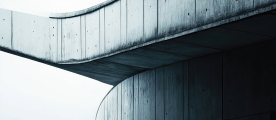 Poster - abstract close-up of a modern concrete architectural structure with curved lines and empty copy spac
