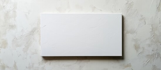 Poster - blank white business card on a textured marble background with ample copy space for text inclusion