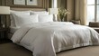 © pngking - Cozy bedroom with white duvet and sheets on double bed complemented by elegant decor and soft natural light