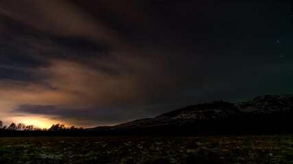 Wall Mural - Rare Colour Of Northern Lights Over Mountains In Skibotn, Norway. Timelapse