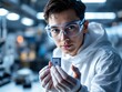 © Zilvinas - Scientist examining a circuit board in a sterile lab environment.