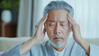 © Wang Dan - Older Asian men have headaches