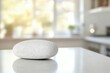White stone kitchen counter, sunlit room, calm scene, product display
