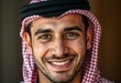 © iushakovsky - Portrait of a smiling Arabic male with a warm gaze