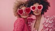 © abdul kahfi - Pink Paradise: Two Stylish Women in Heart-Shaped Sunglasses