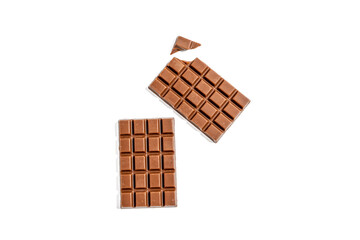 Wall Mural - Two chocolate bars with a piece missing. The stripes are brown and have squares. The bars are on a white background. Chocolate bar on transparent background png format.