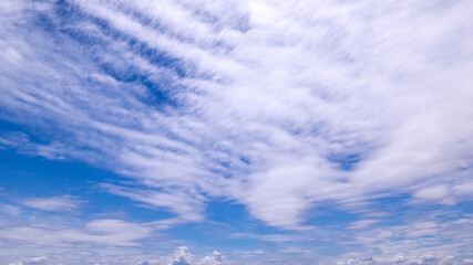 Wall Mural - clear blue sky background,clouds with background, blue sky background with tiny clouds. white fluffy