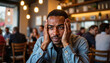 © ChrisKuz - Middle-aged Black man feeling social anxiety in crowded cafe, human phobias