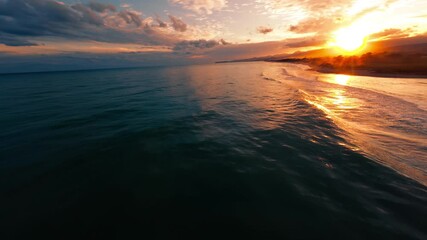Wall Mural - Romantic Sunset Over The Sicily Sea With Waves Crashing On The Shoreline Sunset