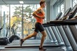 © Stock Photo Memory - Fit Young Man Running on Treadmill in Bright Gym Environment