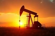 © NEW - A silhouette of an oil pump jack against a vibrant sunset, highlighting the oil industry's impact on nature.