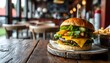 © DesignINKZ - Rustic table with burger and fries. Casual diner bokeh effect in the background