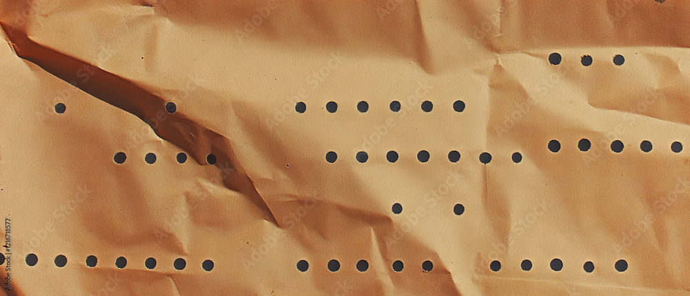 Kraft paper texture featuring a dotted pattern with uniform ...