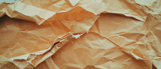 Poster - Kraft paper texture showcasing natural tears and irregular edges for creative projects