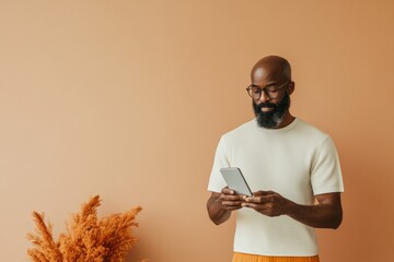 Aufkleber - Smart Home Minimalism Middle-Aged Black Man Using Smartphone to Control Robot Vacuum in Modern Decor - Enhancing Everyday Life with Tech Devices and IoT for Lifestyle Innovations