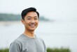 © iushakovsky - Serene outdoor portrait of an Asian male