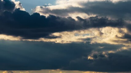 Wall Mural - beautiful dramatic sunset sky with cumulus clouds timelapse for abstract background