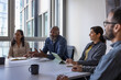© ReeldealHD images - Mature African American businessman leading a business meeting
