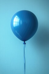 Canvas Print - A blue balloon tied to a string, perfect for decorations or outdoor events