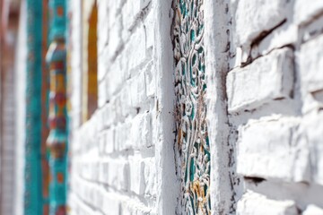 Poster - a white brick wall with an intricate design pattern