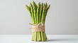 © Shivani - bundle of asparagus stalks tied together