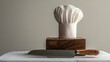 © A4719 - Chef Hat and Knife on Wooden Block A Culinary Still Life