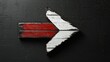 © Irfan - Wooden arrow with white and red design on black, pointing up.