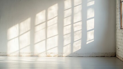 Sticker - Sunlit Industrial Interior with Shadow Patterns on White Wall