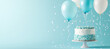 © Jason Yoder - Pastel blue birthday cake with balloons and copy space