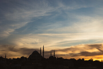 Wall Mural - silhouette of suleymaniye mosque at sunset with dramatic sky