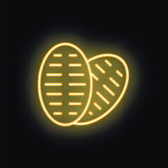 Poster - Bright yellow neon sign of two potatoes is glowing against a black background