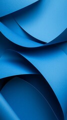 Poster - Close-up view of textured blue paper sheets, curled and folded to create an abstract composition of curves and shadows, offering a minimalist and artistic backdrop