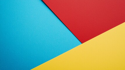 Poster - Colorful abstract background created with overlapping sheets of blue, red, and yellow construction paper, forming a dynamic and vibrant geometric composition