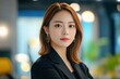 © affa_dreams - Professional Female Portrait in Modern Office Environment with Stylish Hair and Makeup, Highlighting Confidence and Success in Business Settings