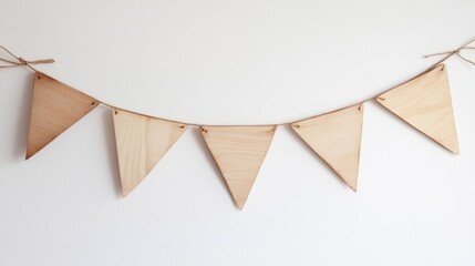 Poster - Wooden bunting flag garland on twine against a light background with copy space for decorations or signage