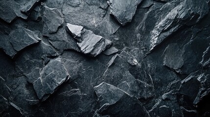 Poster - Textured dark slate rock surface with irregularly shaped pieces and natural patterns suitable for background or abstract design Copy Space