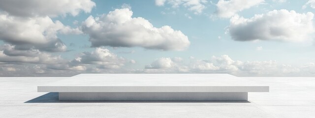 Poster - Minimalist empty platform on a bright blue sky background with fluffy clouds and ample copy space for text placement