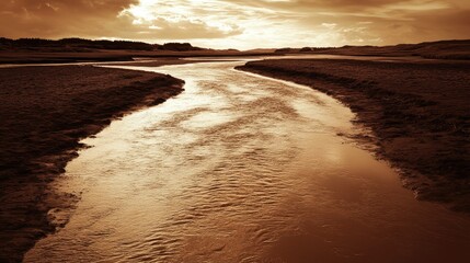 Poster - Winding river landscape at sunset with dramatic skies reflecting on the water surface Copy Space