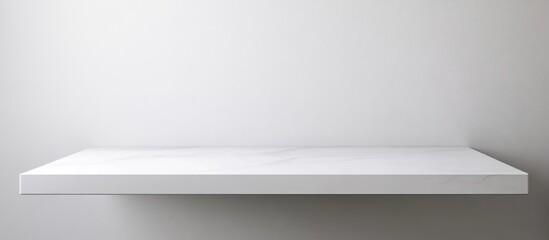 Poster - Minimalistic empty white shelf against a plain wall with ample Copy Space for text placement