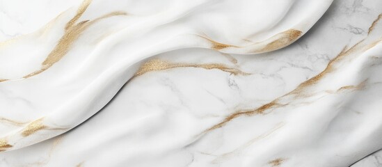 Fototapete - Elegant white marble background with golden veining and soft wave patterns featuring ample copy space.