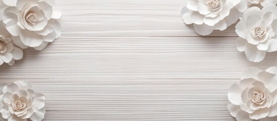 Poster - White floral decorations on a light wooden background with ample copy space for text or graphics