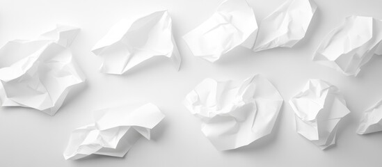 Fototapete - Crumpled white paper sheets on a plain background with copy space for text or graphic design elements