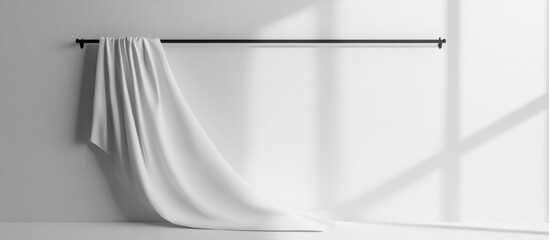 Fototapete - White Fabric Draped Over a Black Rod Against a White Wall with Natural Light and Shadows Copy Space